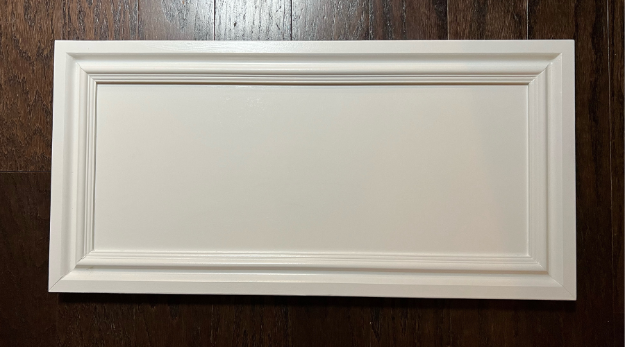 Photo of a front panel from a Chevron style bench