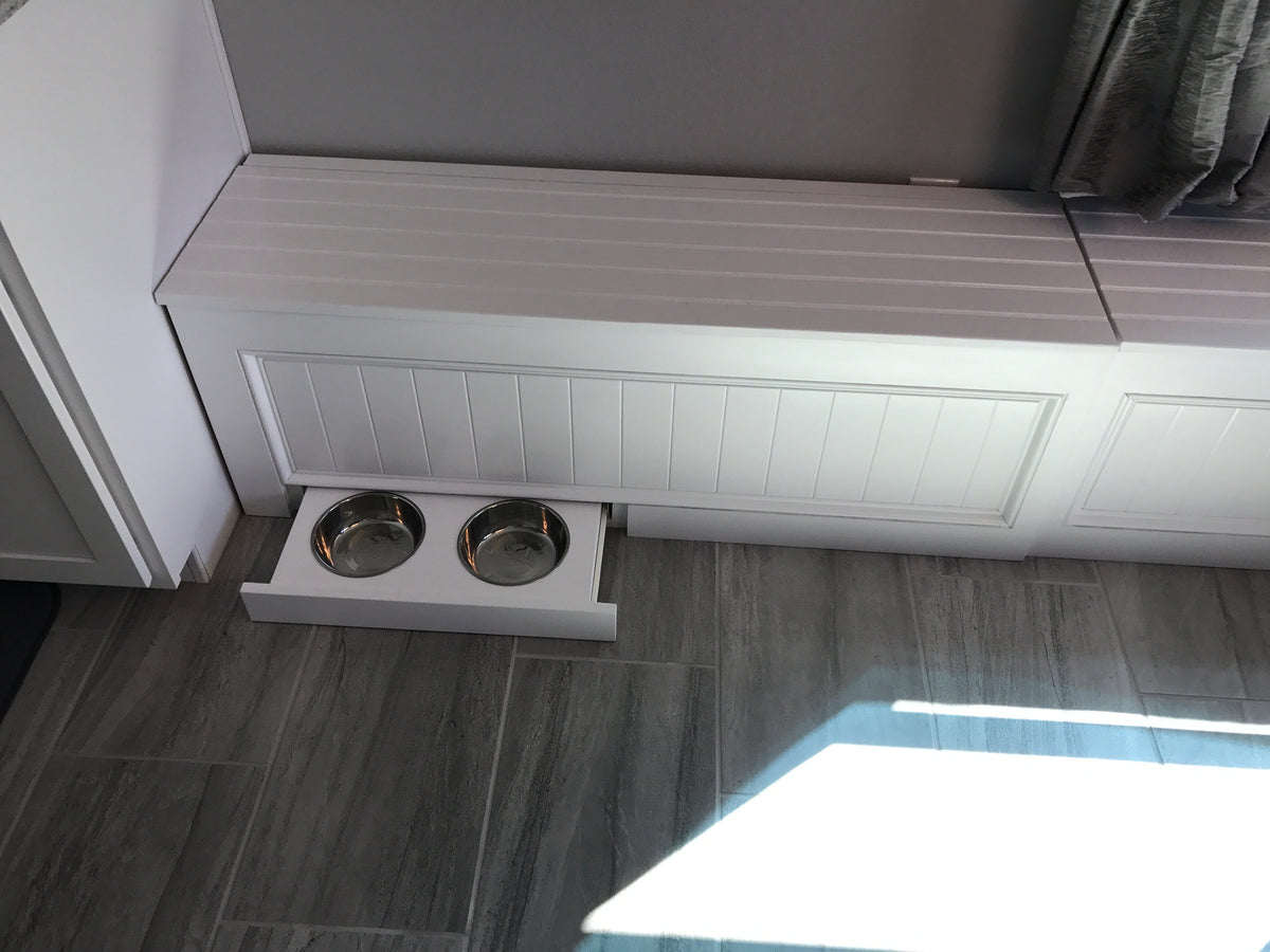 Photo of a Traditional style straight bench with a front retractable two-bowl pet drawer.