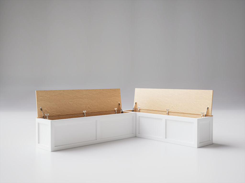 Elegant L-shaped Shaker corner bench with open storage lids showcasing the spacious interior, crafted with a white finish and natural wood lids.