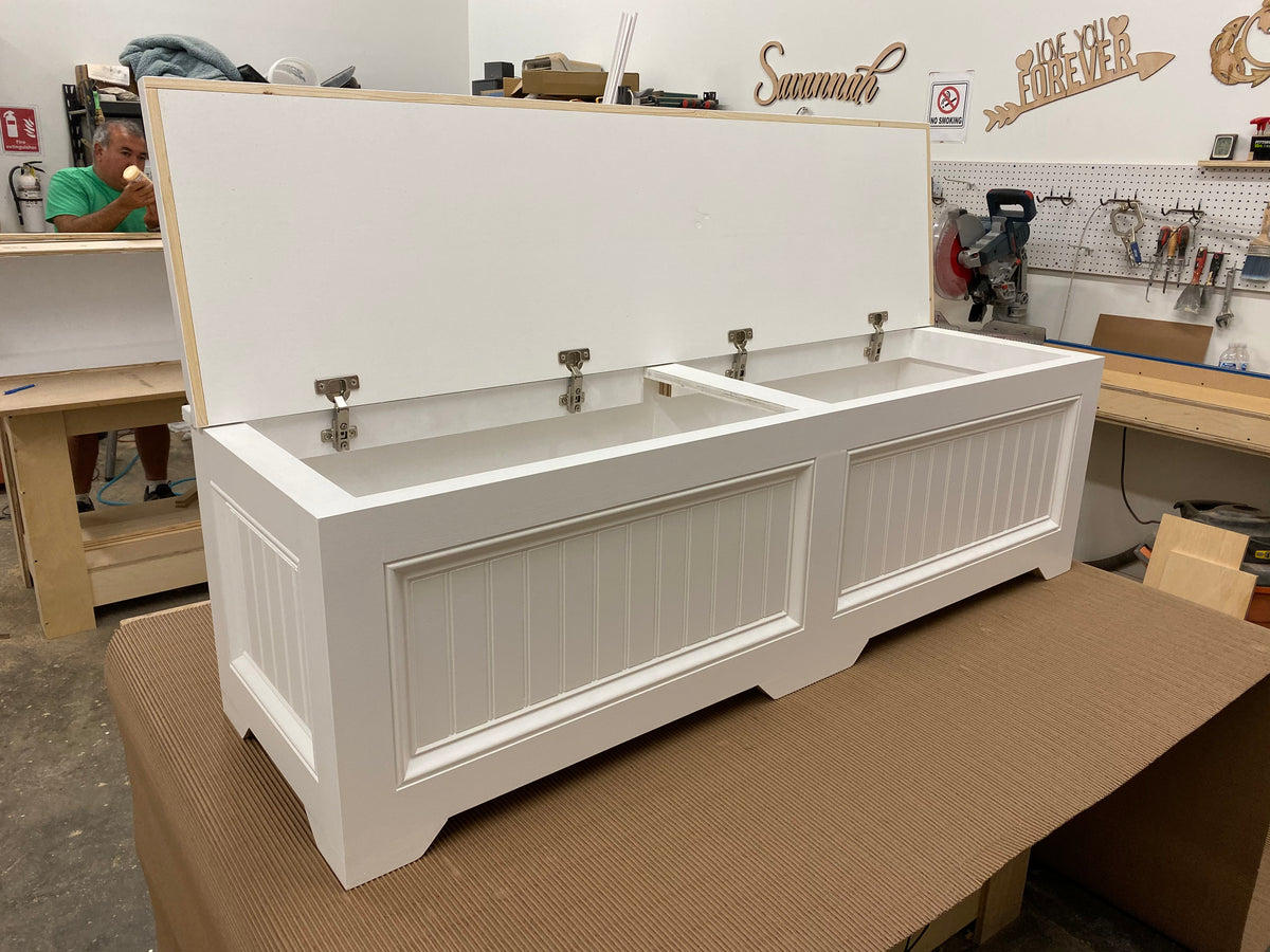 Photo of Traditional style straight bench with lid opened so you can see traditional hinges