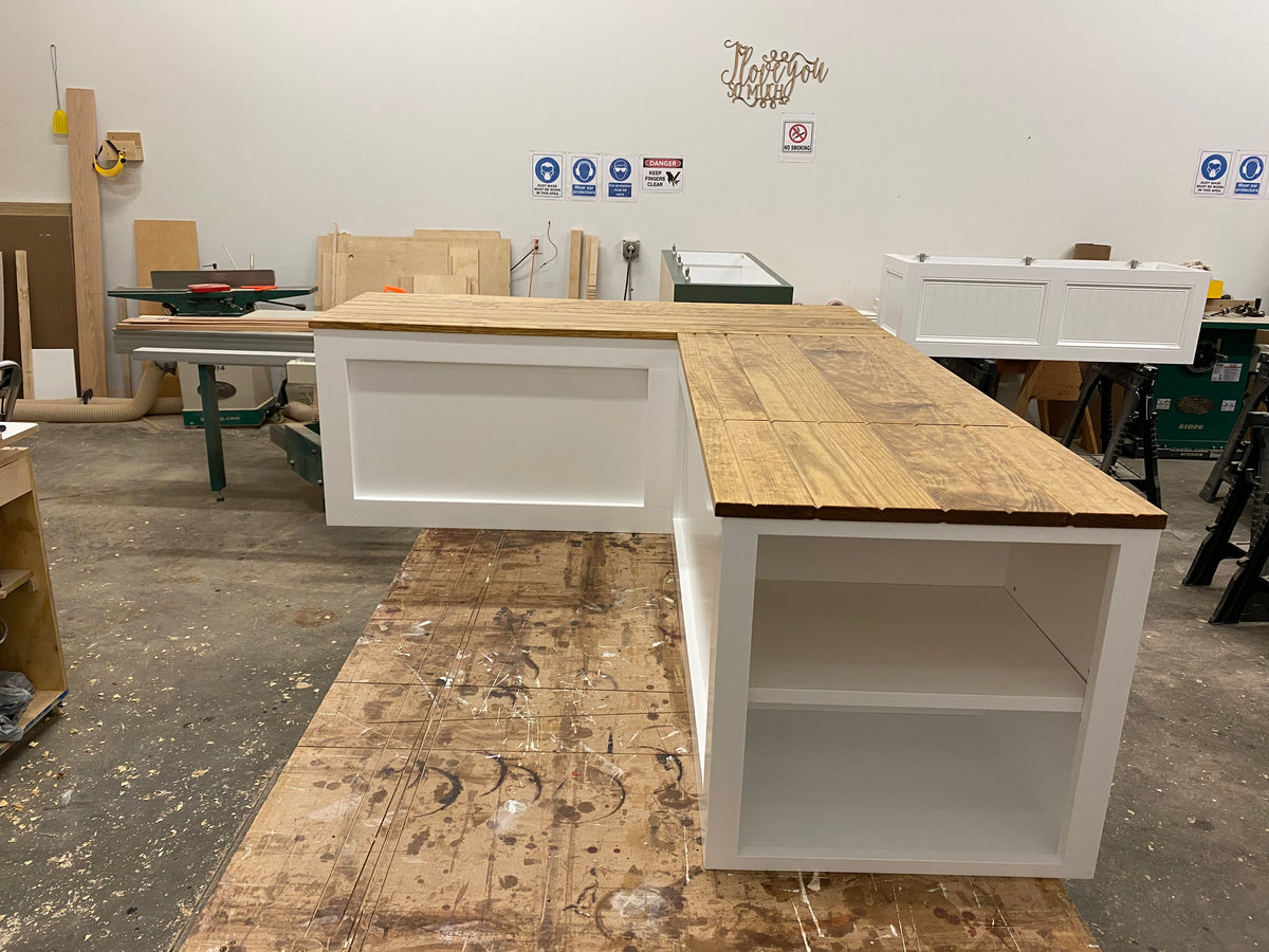 Photo of Shaker Style L-shape bench with two shelves built into the end.