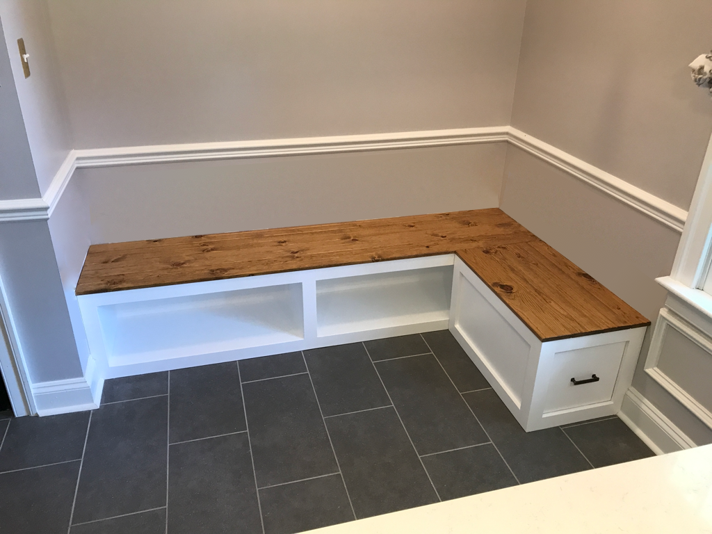 L-shape corner bench with open front cubbies and file drawer